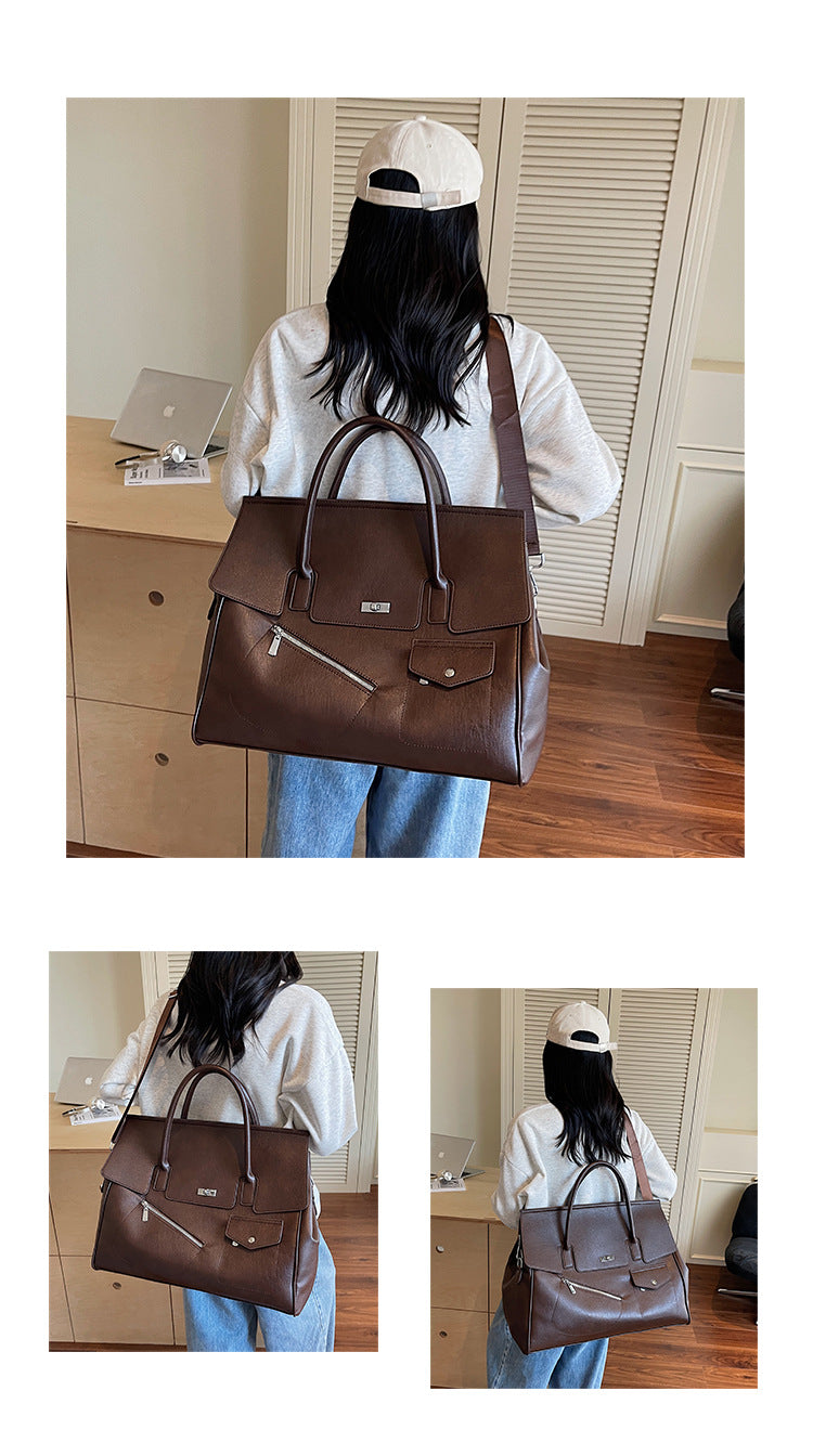 people hoding a brown JOEY Large Faux Leather Multi-use Shoulder Tote Bag with a silver clasp