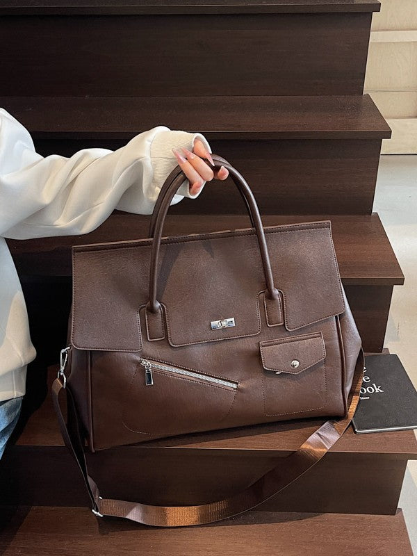 people hoding a brown JOEY Large Faux Leather Multi-use Shoulder Tote Bag with a silver clasp